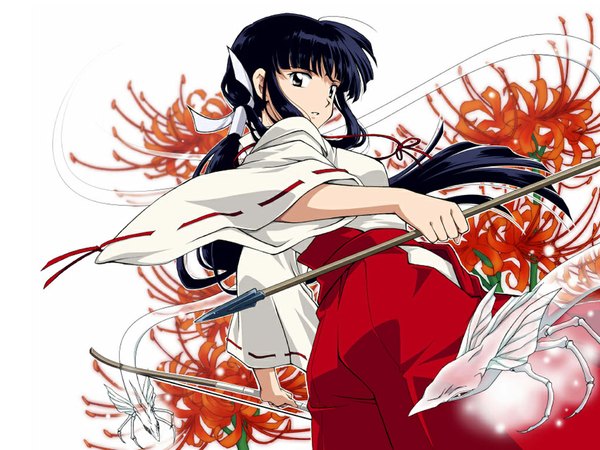 Anime picture 1024x768 with inuyasha kikyou single long hair black hair looking back black eyes miko girl flower (flowers) bow (weapon) higanbana