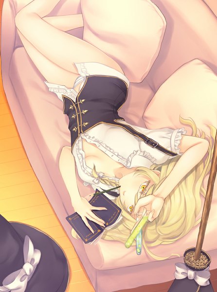 Anime picture 743x1000 with touhou kirisame marisa porigon single long hair tall image light erotic blonde hair yellow eyes lying girl underwear panties pillow book (books) witch hat couch