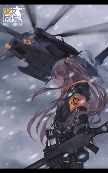 Anime picture 1150x1834 with girls frontline ump45 (girls frontline) litra (ltr0312) single long hair tall image fringe hair between eyes brown hair standing twintails holding outdoors profile wind blurry from below orange eyes copyright name snowing
