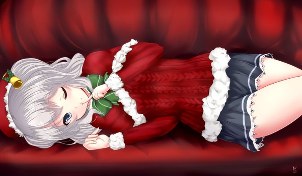 Anime picture 1364x800 with kantai collection kashima training cruiser myuu (arisumeria) single long hair looking at viewer blush blue eyes wide image twintails silver hair lying long sleeves one eye closed light smile bare legs finger to mouth christmas red background girl