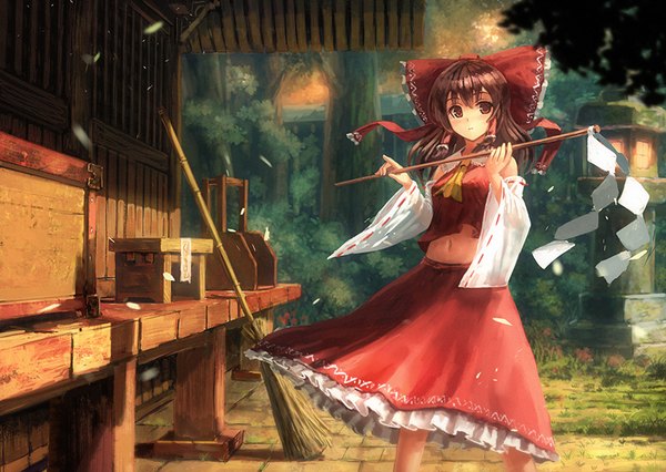 Anime picture 900x640 with touhou hakurei reimu yoshitake single long hair fringe red eyes brown hair standing twintails holding outdoors long sleeves wind wide sleeves bare belly shadow girl skirt navel