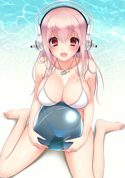 Anime picture 700x1000 with nitroplus super sonico ayase hazuki long hair tall image looking at viewer blush fringe breasts open mouth light erotic large breasts sitting pink hair pink eyes lips lipstick beach wariza happy