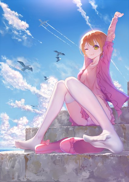 Anime picture 956x1350 with love live! school idol project sunrise (studio) love live! hoshizora rin hoshi o mite single tall image fringe short hair light erotic smile hair between eyes sitting green eyes looking away sky cloud (clouds) full body bent knee (knees) pleated skirt