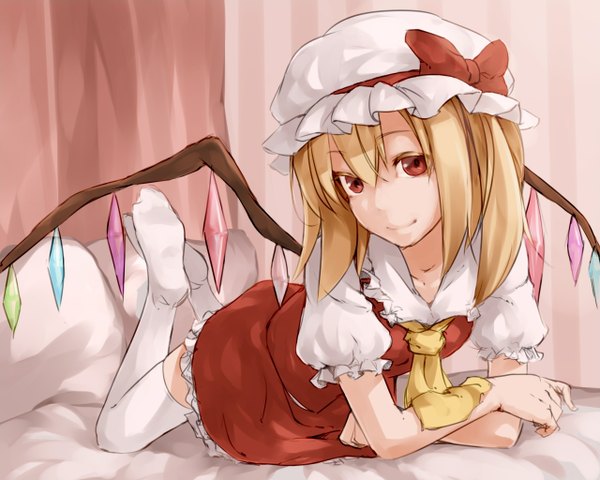 Anime picture 1280x1024 with touhou flandre scarlet junwool single looking at viewer fringe short hair blonde hair hair between eyes red eyes lying light smile on stomach girl thighhighs bow white thighhighs wings bonnet couch