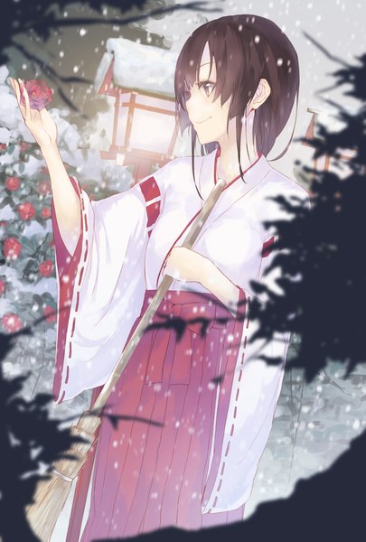 Anime picture 3150x4661 with original la-na single tall image fringe highres short hair brown hair standing holding brown eyes absurdres traditional clothes profile light smile wide sleeves dutch angle snowing winter miko