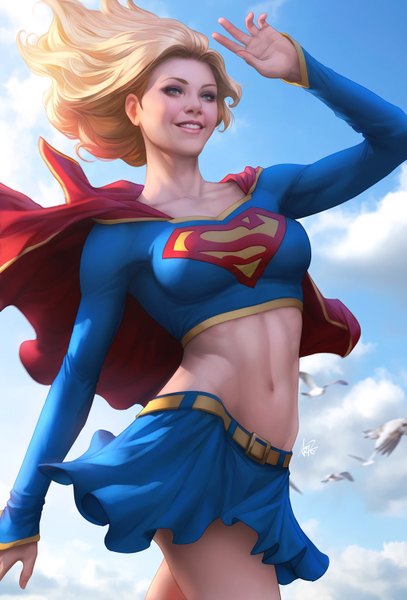 Anime picture 1019x1500 with dc comics supergirl artgerm (stanley lau) single long hair tall image blue eyes blonde hair smile signed looking away sky cloud (clouds) outdoors arm up wind lips sunlight realistic teeth