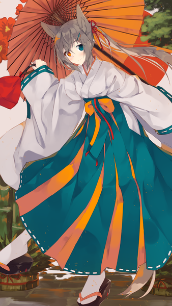 Anime picture 855x1518 with original nagishiro mito single long hair tall image looking at viewer blush fringe blue eyes smile hair between eyes brown hair standing holding animal ears payot ponytail tail traditional clothes japanese clothes