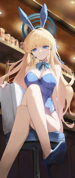 Anime-Bild 1362x3200 mit blue archive toki (blue archive) toki (bunny) (blue archive) emollllno single long hair tall image looking at viewer fringe breasts blue eyes light erotic blonde hair large breasts sitting bare shoulders animal ears cleavage indoors blunt bangs
