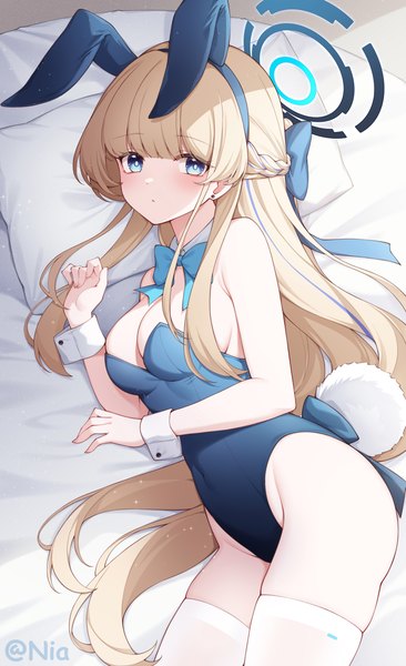 Anime picture 3000x4923 with blue archive toki (blue archive) toki (bunny) (blue archive) poinia single long hair tall image looking at viewer blush fringe highres breasts blue eyes light erotic blonde hair bare shoulders signed animal ears tail lying