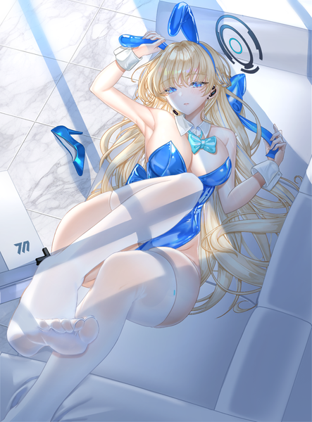 Anime picture 1200x1627 with blue archive toki (blue archive) toki (bunny) (blue archive) zzinbbang single long hair tall image looking at viewer fringe breasts blue eyes light erotic blonde hair large breasts bare shoulders animal ears cleavage bent knee (knees) lying blunt bangs