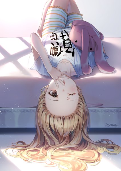 Anime picture 700x990 with idolmaster idolmaster cinderella girls futaba anzu roang single long hair tall image looking at viewer blush open mouth blonde hair brown eyes signed indoors lying one eye closed :o on back hand to mouth clothes writing