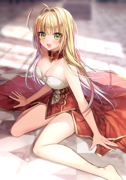 Anime picture 918x1314 with fate (series) fate/extra nero claudius (fate) (all) nero claudius (fate) gambe single long hair tall image looking at viewer blush fringe breasts open mouth light erotic blonde hair smile hair between eyes large breasts sitting bare shoulders