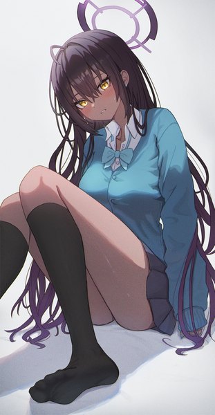 Anime picture 1950x3766 with blue archive karin (blue archive) icetea774 single long hair tall image blush fringe highres light erotic black hair simple background hair between eyes sitting yellow eyes pleated skirt grey background no shoes dark skin looking down