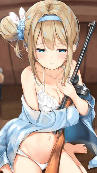 Anime picture 1075x1908 with girls frontline suomi kp31 (girls frontline) sashima single long hair tall image blush fringe breasts blue eyes light erotic blonde hair smile hair between eyes sitting bare shoulders holding payot looking away indoors