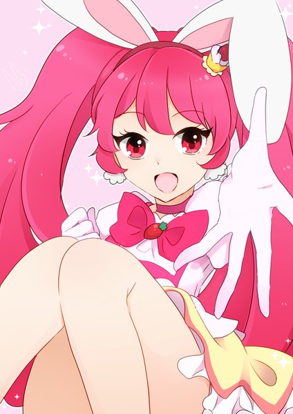 Anime picture 1200x1697 with precure kirakira precure a la mode toei animation usami ichika cure whip nagano ayu single long hair tall image looking at viewer simple background red eyes sitting twintails animal ears pink hair sparkle bunny ears pink background outstretched hand