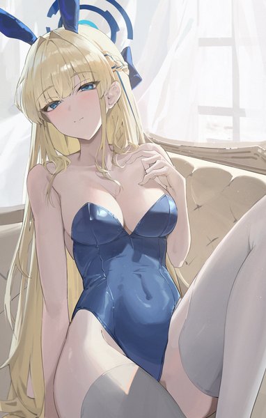 Anime picture 1097x1721 with blue archive toki (blue archive) toki (bunny) (blue archive) pray (furei) single long hair tall image looking at viewer blush fringe breasts blue eyes light erotic blonde hair large breasts sitting bare shoulders animal ears cleavage blunt bangs