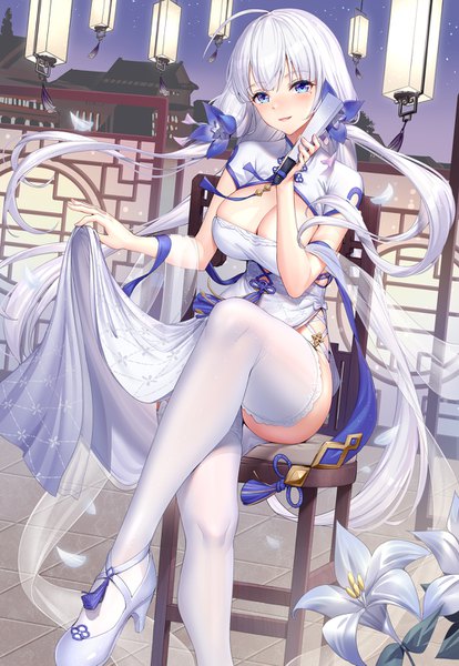 Anime picture 1000x1449 with azur lane illustrious (azur lane) illustrious (maiden lily's radiance) (azur lane) ririko (zhuoyandesailaer) single long hair tall image looking at viewer blush fringe breasts open mouth blue eyes light erotic smile large breasts sitting holding cleavage ahoge