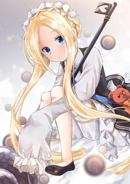 Anime picture 1061x1500 with fate (series) fate/grand order abigail williams (fate) iroha (shiki) single long hair tall image looking at viewer blue eyes blonde hair sitting braid (braids) long sleeves depth of field alternate costume alternate hairstyle crown braid hands in sleeves knees together feet apart girl