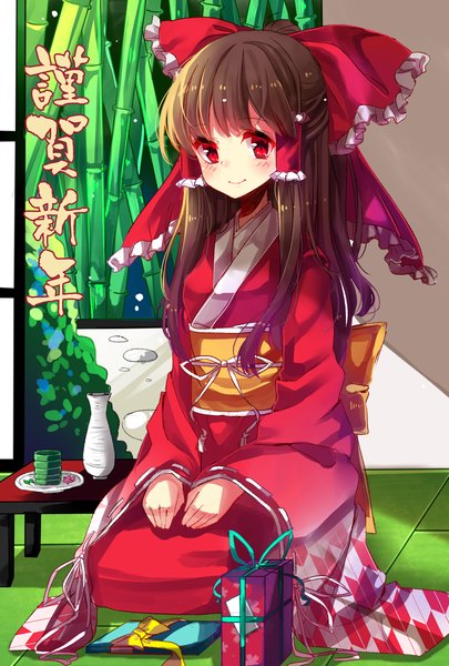 Anime picture 1228x1819 with touhou hakurei reimu kazucha single long hair tall image looking at viewer blush smile red eyes brown hair sitting traditional clothes japanese clothes girl bow plant (plants) hair bow kimono gift