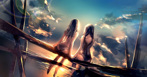 Anime picture 833x439 with original irua long hair light erotic black hair wide image sitting bare shoulders multiple girls sky cloud (clouds) from behind sunlight bare legs back evening sunset sunbeam girl 2 girls