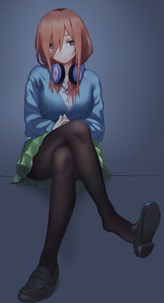 Anime picture 1128x2082 with go-toubun no hanayome nakano miku bottle7 single long hair tall image looking at viewer fringe breasts blue eyes simple background hair between eyes brown hair sitting payot full body pleated skirt crossed legs expressionless headphones around neck