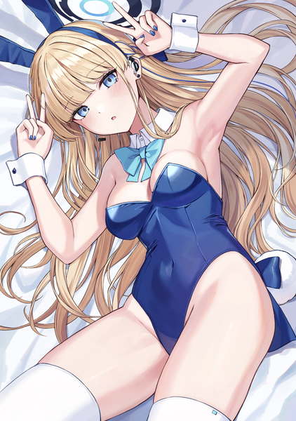 Anime picture 1764x2508 with blue archive toki (blue archive) toki (bunny) (blue archive) kurousagi yuu single long hair tall image looking at viewer blush fringe highres open mouth blue eyes light erotic blonde hair animal ears tail lying blunt bangs nail polish
