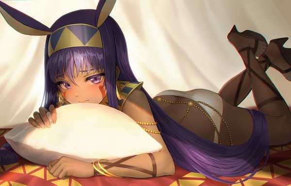 Anime picture 1139x728 with fate (series) fate/grand order nitocris (fate) sion (9117) single long hair looking at viewer blush fringe light erotic hair between eyes purple eyes animal ears purple hair lying fingernails bunny ears dark skin on stomach leg lift (legs lift)