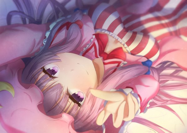 Anime picture 1087x777 with touhou patchouli knowledge ram hachimin single long hair looking at viewer blush fringe breasts smile purple eyes cleavage purple hair lying blurry on back depth of field striped outstretched hand girl
