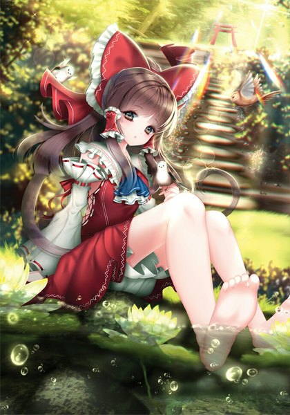 Anime picture 677x968 with touhou hakurei reimu radge single long hair tall image looking at viewer blush brown hair brown eyes traditional clothes japanese clothes barefoot miko girl skirt flower (flowers) bow hair bow animal