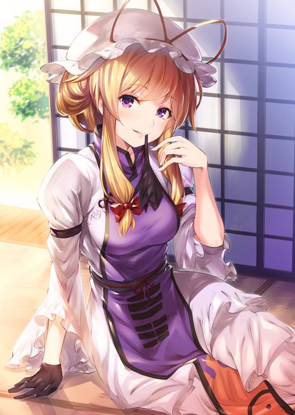 Anime picture 1224x1718 with touhou yakumo yukari akanagi youto single long hair tall image looking at viewer blush fringe breasts blonde hair sitting purple eyes holding payot indoors sunlight wide sleeves arm support mouth hold