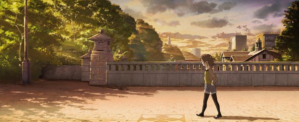 Anime picture 1707x698 with original topipan single short hair brown hair wide image brown eyes profile city cityscape walking hands in pockets girl plant (plants) pantyhose tree (trees) shorts