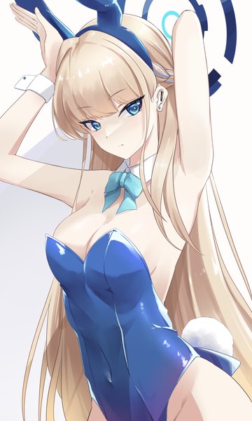 Anime picture 2118x3531 with blue archive toki (blue archive) toki (bunny) (blue archive) niie single long hair tall image looking at viewer blush fringe highres breasts blue eyes light erotic simple background blonde hair large breasts standing white background animal ears