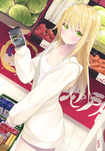 Anime picture 1396x2000 with original sasahara wakaba single long hair tall image looking at viewer blush fringe breasts blonde hair hair between eyes standing holding green eyes cleavage indoors long sleeves open jacket dutch angle sleeves past wrists