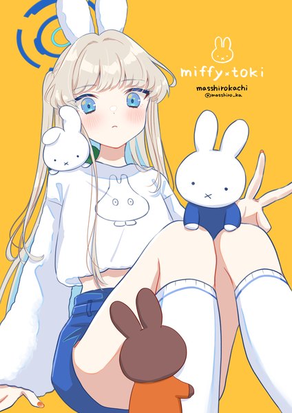 Anime-Bild 1202x1700 mit miffy blue archive toki (blue archive) masshirokachi single long hair tall image looking at viewer blush blue eyes simple background blonde hair signed animal ears bunny ears character names twitter username one side up yellow background girl
