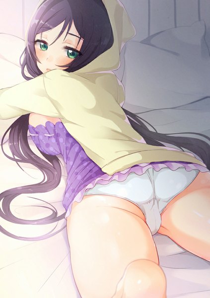Anime picture 650x922 with love live! school idol project sunrise (studio) love live! toujou nozomi hym9594 single long hair tall image looking at viewer blush breasts light erotic black hair large breasts twintails green eyes lying parted lips looking back low twintails