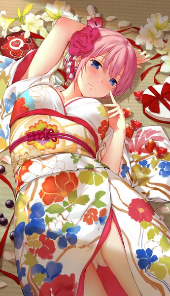 Anime picture 1268x2200 with go-toubun no hanayome nakano ichika yijian ma single tall image looking at viewer blush fringe short hair breasts blue eyes light erotic hair between eyes pink hair lying traditional clothes japanese clothes arm up hair flower on back