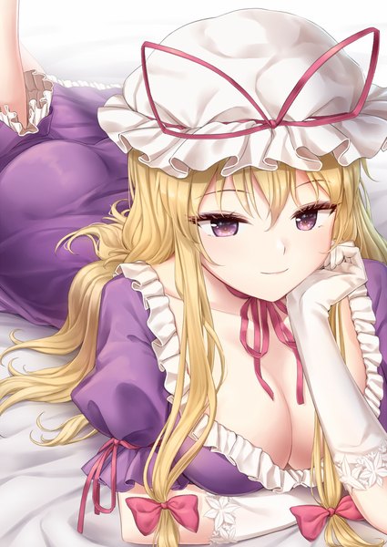 Anime picture 860x1214 with touhou yakumo yukari minust single long hair tall image looking at viewer blush fringe breasts light erotic simple background blonde hair hair between eyes large breasts standing white background purple eyes cleavage ass