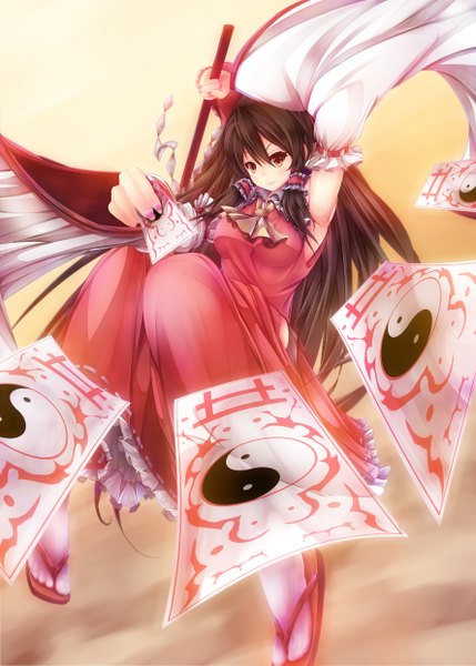 Anime picture 888x1243 with touhou hakurei reimu sawa nao single long hair tall image looking at viewer black hair hair between eyes brown eyes traditional clothes miko girl detached sleeves gohei ofuda