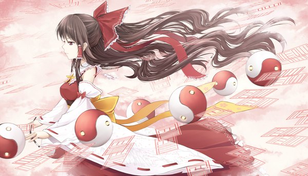 Anime picture 2200x1257 with touhou hakurei reimu cloudy.r single long hair fringe highres breasts red eyes brown hair wide image bare shoulders holding payot long sleeves profile wind wide sleeves floral print half updo