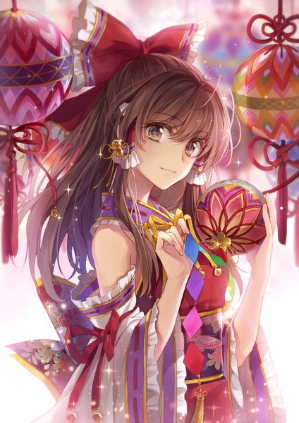 Anime picture 707x1000 with touhou hakurei reimu hagiwara rin single long hair tall image looking at viewer fringe hair between eyes brown hair holding brown eyes upper body ahoge traditional clothes japanese clothes light smile blurry wide sleeves sparkle