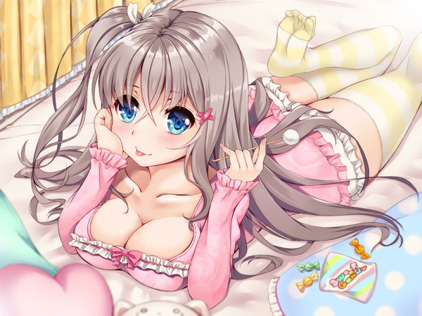 Anime picture 1600x1199 with original ko yu single long hair looking at viewer blush fringe breasts open mouth blue eyes light erotic smile hair between eyes large breasts holding bent knee (knees) indoors lying :d grey hair