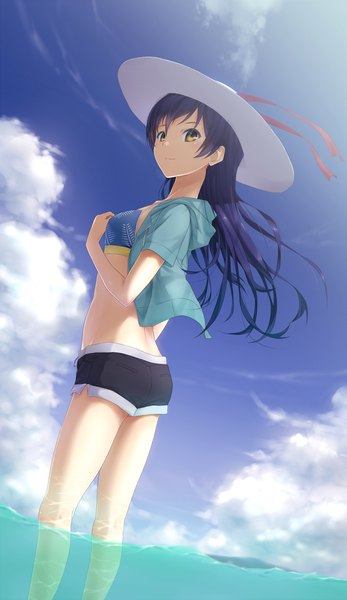 Anime picture 1000x1725 with love live! school idol project sunrise (studio) love live! sonoda umi seirei911 single long hair tall image looking at viewer black hair brown eyes sky cloud (clouds) girl hat water shorts sea short shorts