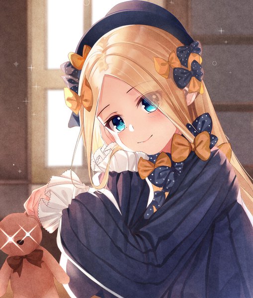 Anime picture 1000x1178 with fate (series) fate/grand order abigail williams (fate) dhfz181 single long hair tall image looking at viewer blush fringe blue eyes blonde hair smile holding payot upper body indoors sleeves past wrists chin rest girl