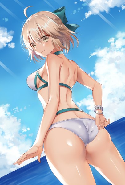 Anime picture 1000x1476 with fate (series) fate/grand order okita souji (fate) (all) okita souji (swimsuit assassin) (fate) harimoji single tall image looking at viewer blush fringe short hair breasts light erotic blonde hair hair between eyes standing bare shoulders yellow eyes sky cloud (clouds)