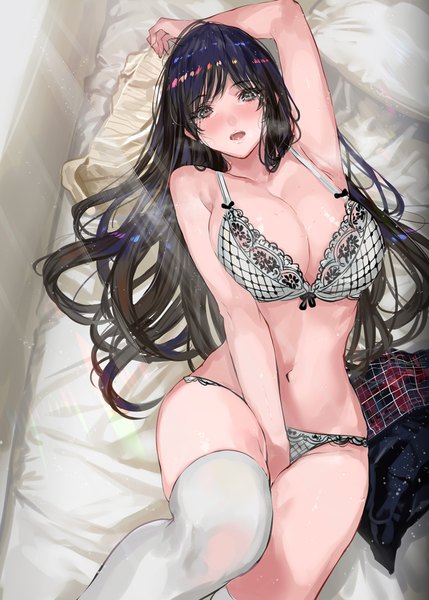 Anime picture 786x1100 with original ranou single long hair tall image looking at viewer blush fringe breasts open mouth light erotic black hair large breasts cleavage lying arm up sunlight mole on back grey eyes