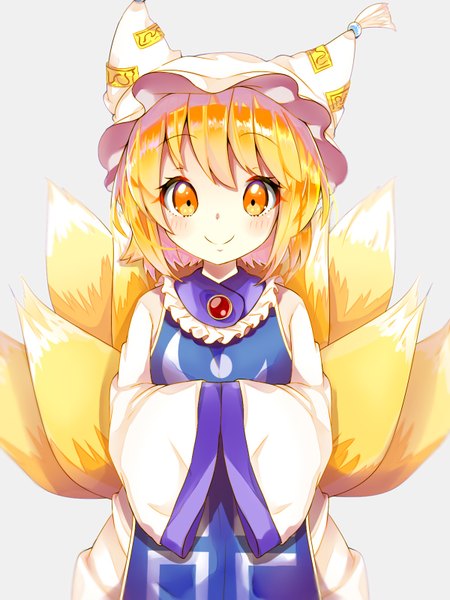 Anime picture 1200x1600 with touhou yakumo ran solanikieru single tall image looking at viewer blush fringe short hair simple background blonde hair smile tail animal tail grey background orange eyes fox tail fox girl multiple tails cute