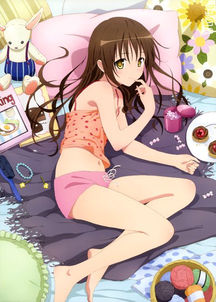 Anime picture 4204x5860 with toloveru megami magazine xebec yuuki mikan long hair tall image highres light erotic brown hair yellow eyes absurdres lying official art girl navel pillow jewelry toy stuffed animal candy