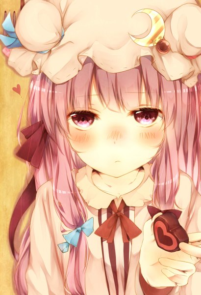 Anime picture 1000x1460 with touhou patchouli knowledge misa (kaeruhitode) single tall image looking at viewer blush fringe purple eyes purple hair embarrassed outstretched arm valentine girl bow hair bow food sweets bonnet chocolate