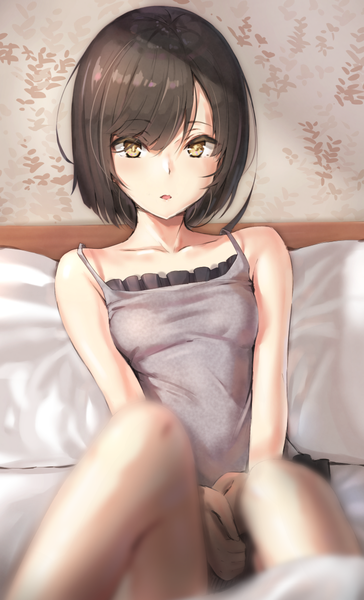 Anime picture 724x1191 with original reinama single tall image looking at viewer fringe short hair breasts open mouth hair between eyes yellow eyes blurry :o depth of field sleeveless reclining girl pillow bedsheet nightie