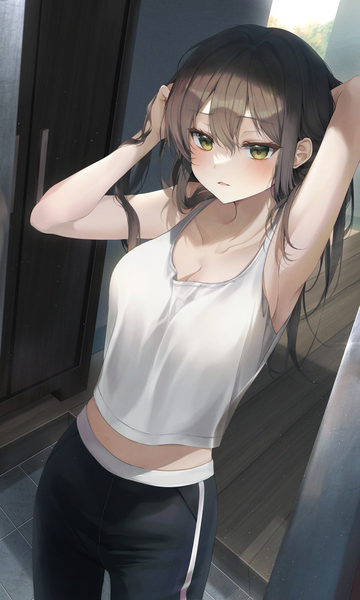 Anime picture 1208x2014 with original solcha single long hair tall image looking at viewer blush fringe breasts hair between eyes brown hair standing yellow eyes cleavage indoors arms up armpit (armpits) midriff dutch angle adjusting hair
